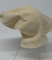 Podkapa, ročno pletena iz tanke bele bombažne preje / neznanega izvora / iz zbirke SEM / foto: J. Žagar. 