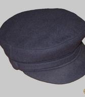 Kapa s ščitnikom iz temno modrega sukna, z mehkim oglavjem in trdim polkrožnim ščitnikom. Do leta 1998 jo je uporabljal ljubljanski kovinostrugar / Ljubljana / iz zbirke SEM / foto: J. Žagar.