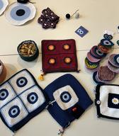 Fotoutrinki z delavnice izdelovanja kvačkanih amuletov