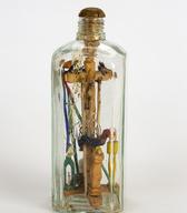 Sestavljanka v steklenici (trplenje v glažu). Les, steklo, 1954. ._foto Blaž Verbič SEM
